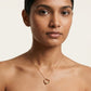 Elegant Gold Heart Pendant Necklace With Diamond Design