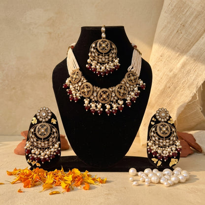 Stone Studded Brass Heavy Necklace Set With Earrings And Mangtika
