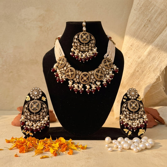 Stone Studded Brass Heavy Necklace Set With Earrings And Mangtika